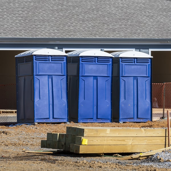 how often are the portable restrooms cleaned and serviced during a rental period in Newell